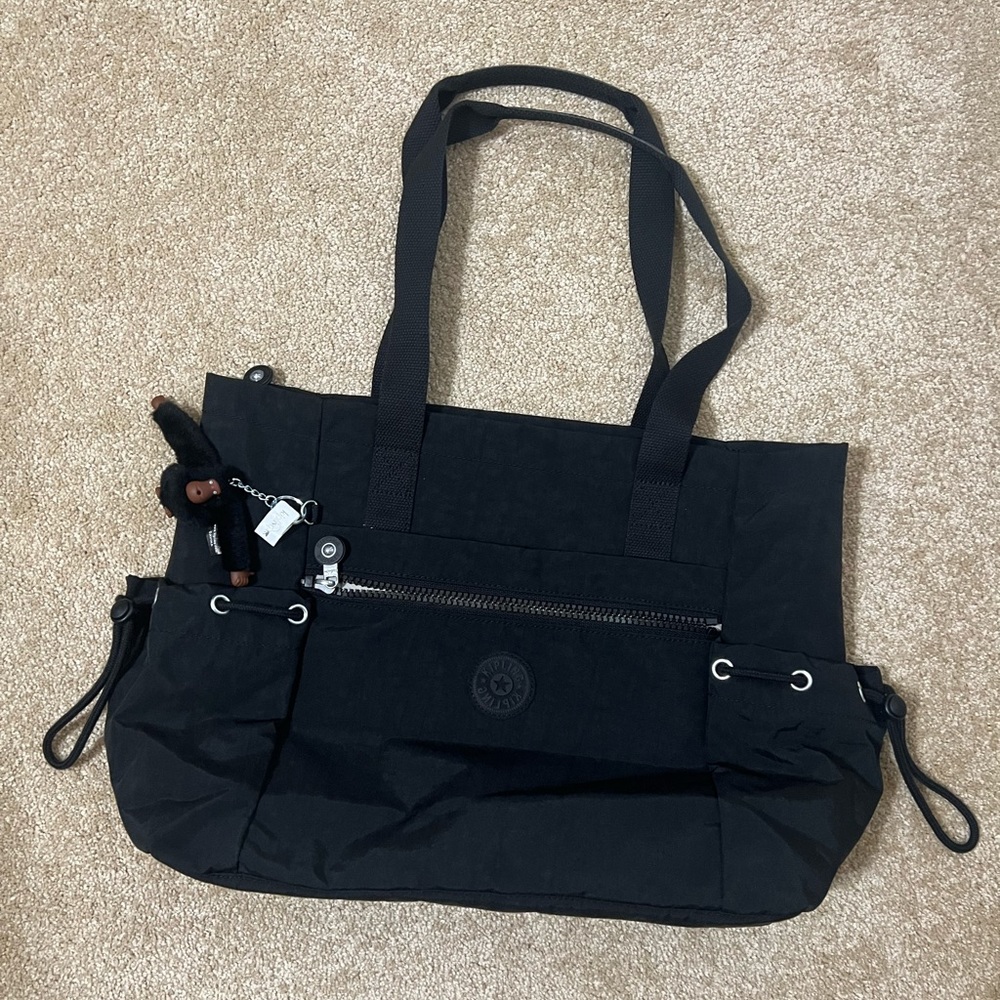 NWOT: kipling large shoulder bag.  Very roomy, lots of pockets